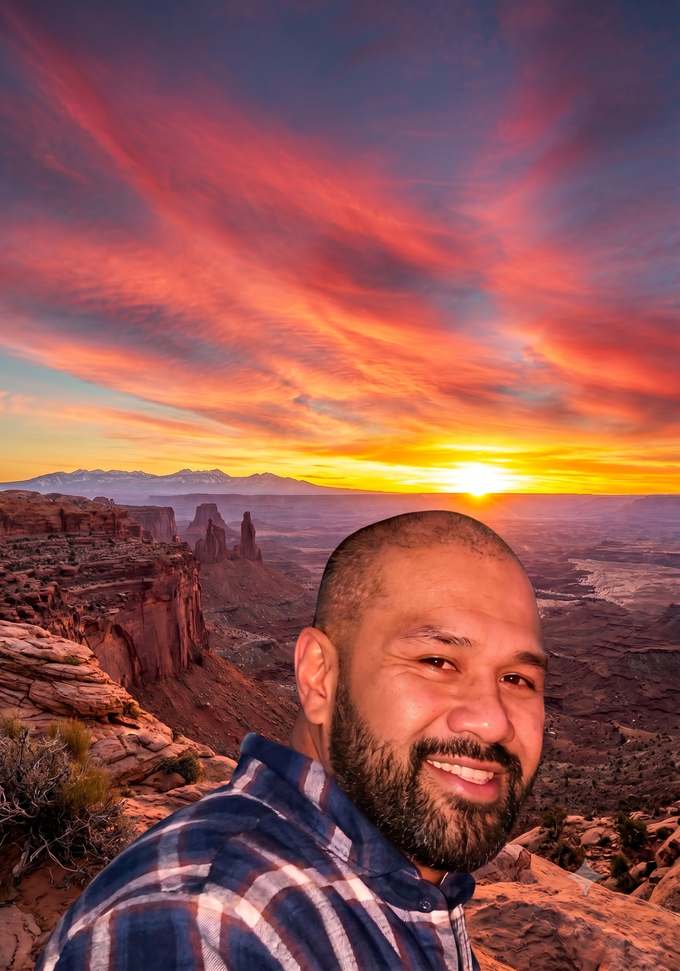 Johnny Toa Moa smiling at sunset over the Utah canyonlands